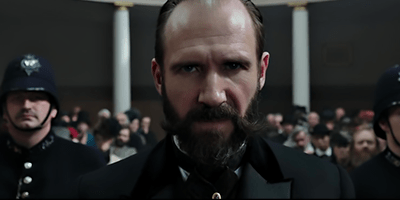 Holmes & Watson Ralph Fiennes.png